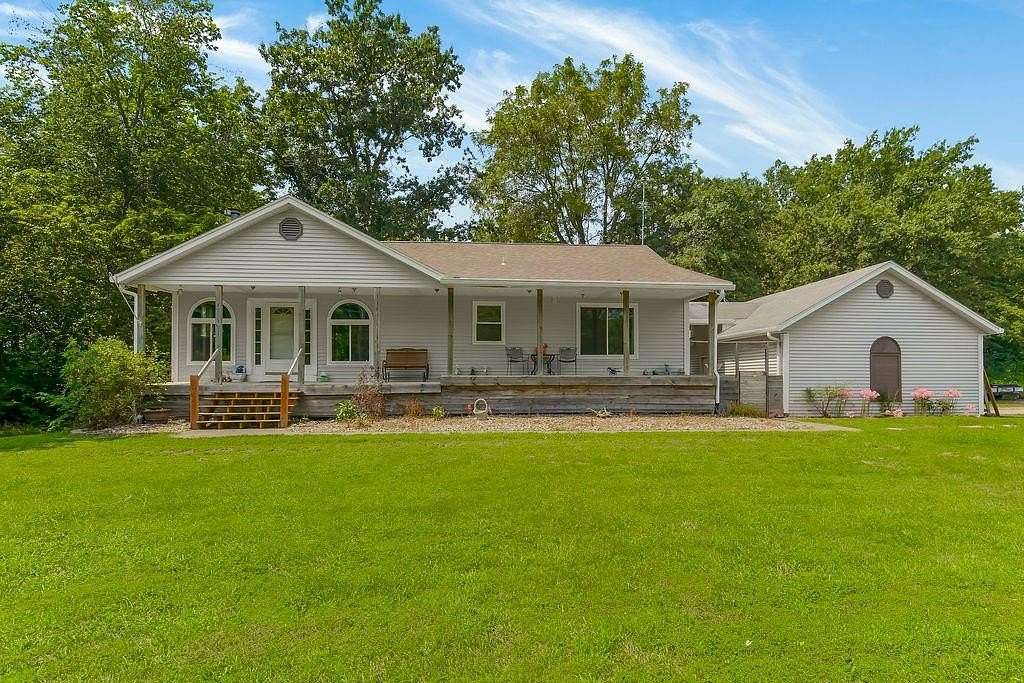 21 Acres of Land with Home for Sale in Holden, Missouri