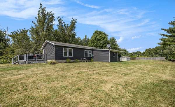 9.53 Acres of Residential Land with Home for Sale in Howard City, Michigan