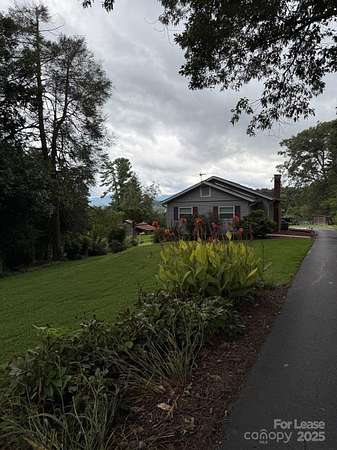 1.67 Acres of Residential Land with Home for Lease in Candler, North Carolina