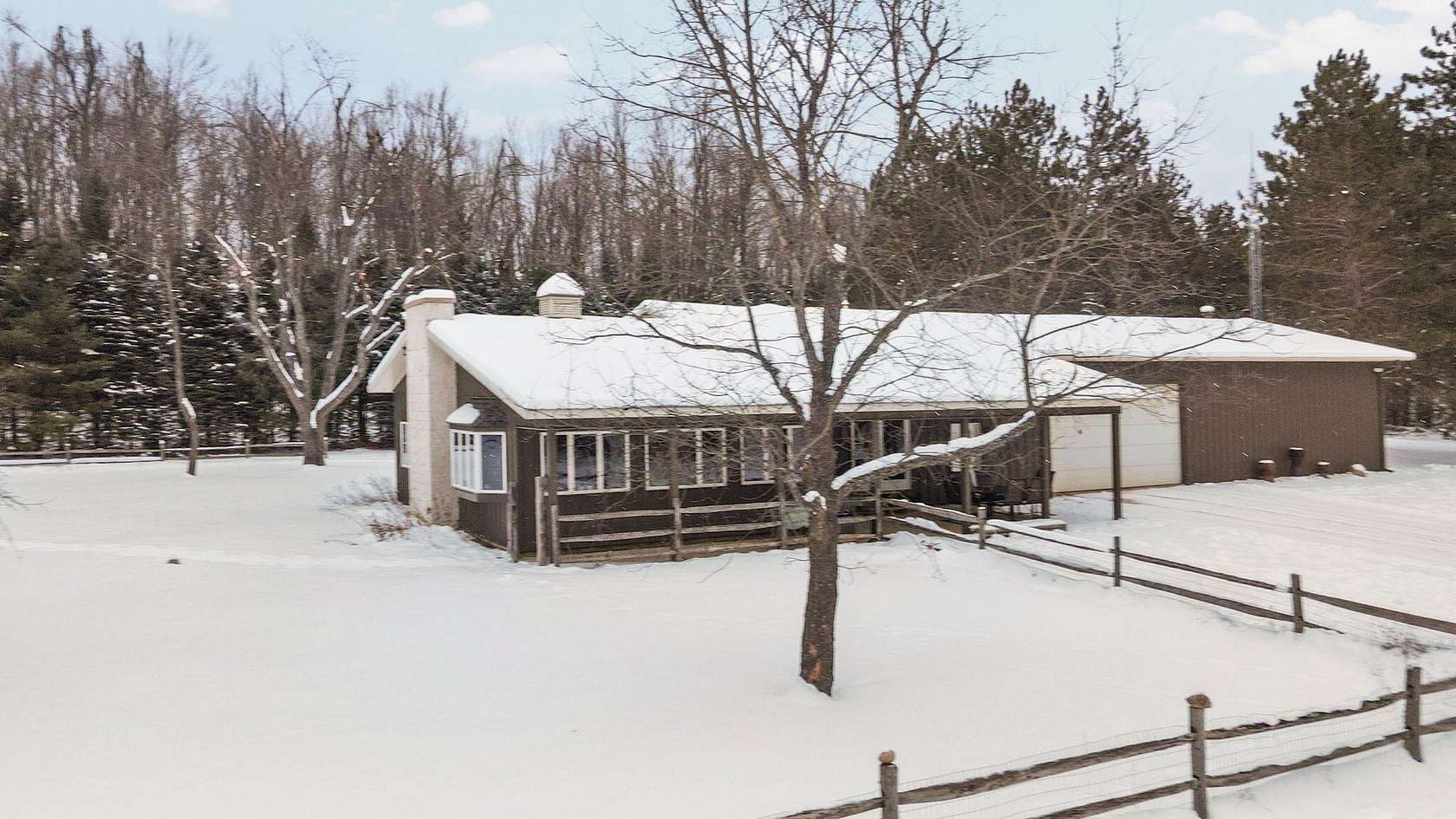 80 Acres of Recreational Land with Home for Sale in Vanderbilt, Michigan