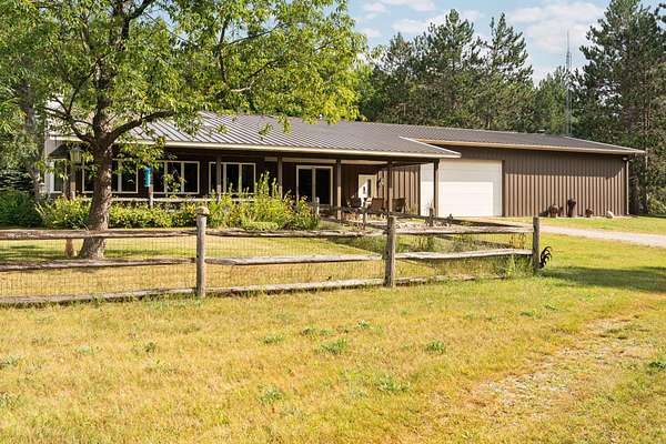 80 Acres of Recreational Land with Home for Sale in Vanderbilt, Michigan