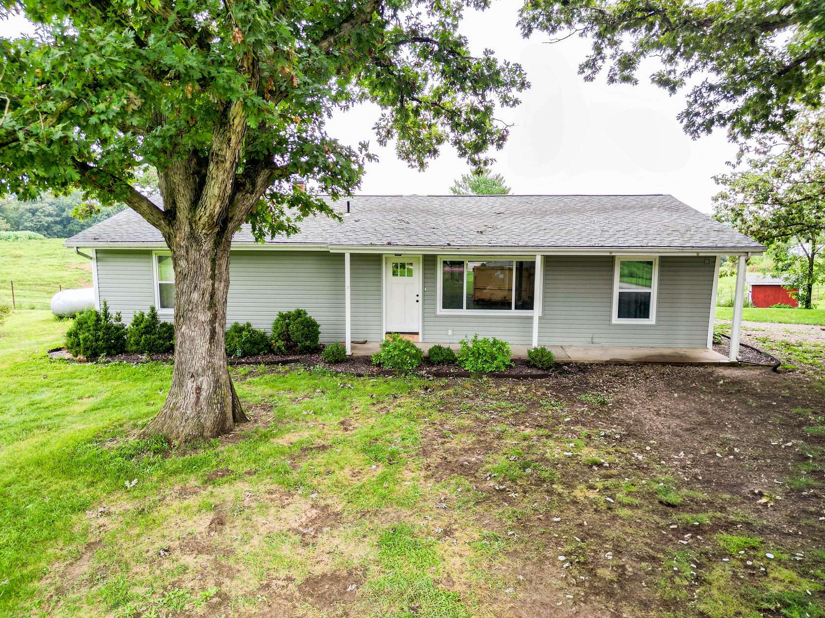 10 Acres of Land with Home for Sale in Higbee, Missouri