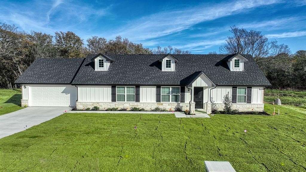 2 Acres of Residential Land with Home for Sale in Poolville, Texas