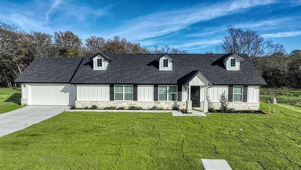 2 Acres of Residential Land with Home for Sale in Poolville, Texas