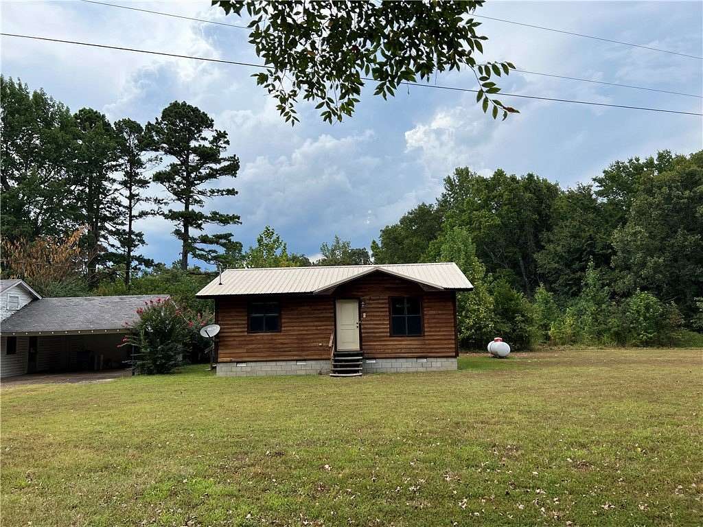 5 Acres of Land with Home for Sale in Clarksville, Arkansas
