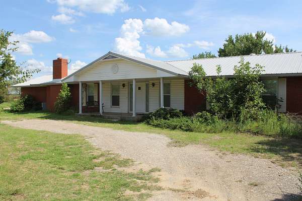 10 Acres of Residential Land with Home for Sale in Mooreland, Oklahoma