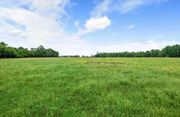 124 Acres of Land with Home for Sale in Bogata, Texas