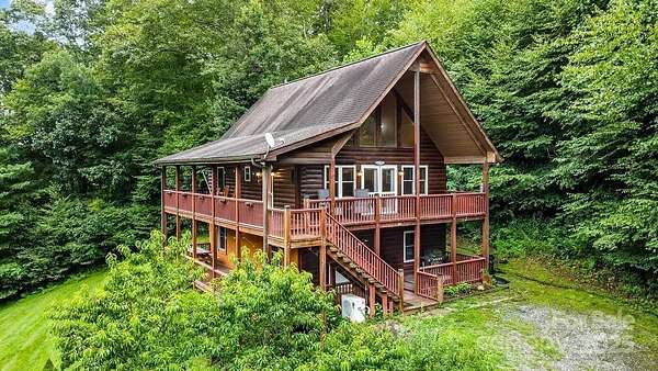 2 Acres of Residential Land with Home for Sale in Grassy Creek, North Carolina