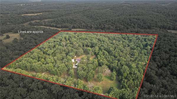 35.6 Acres of Recreational Land with Home for Sale in Gravois Mills, Missouri