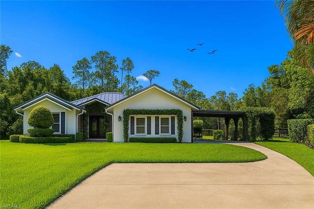 2.27 Acres of Residential Land with Home for Sale in Naples, Florida