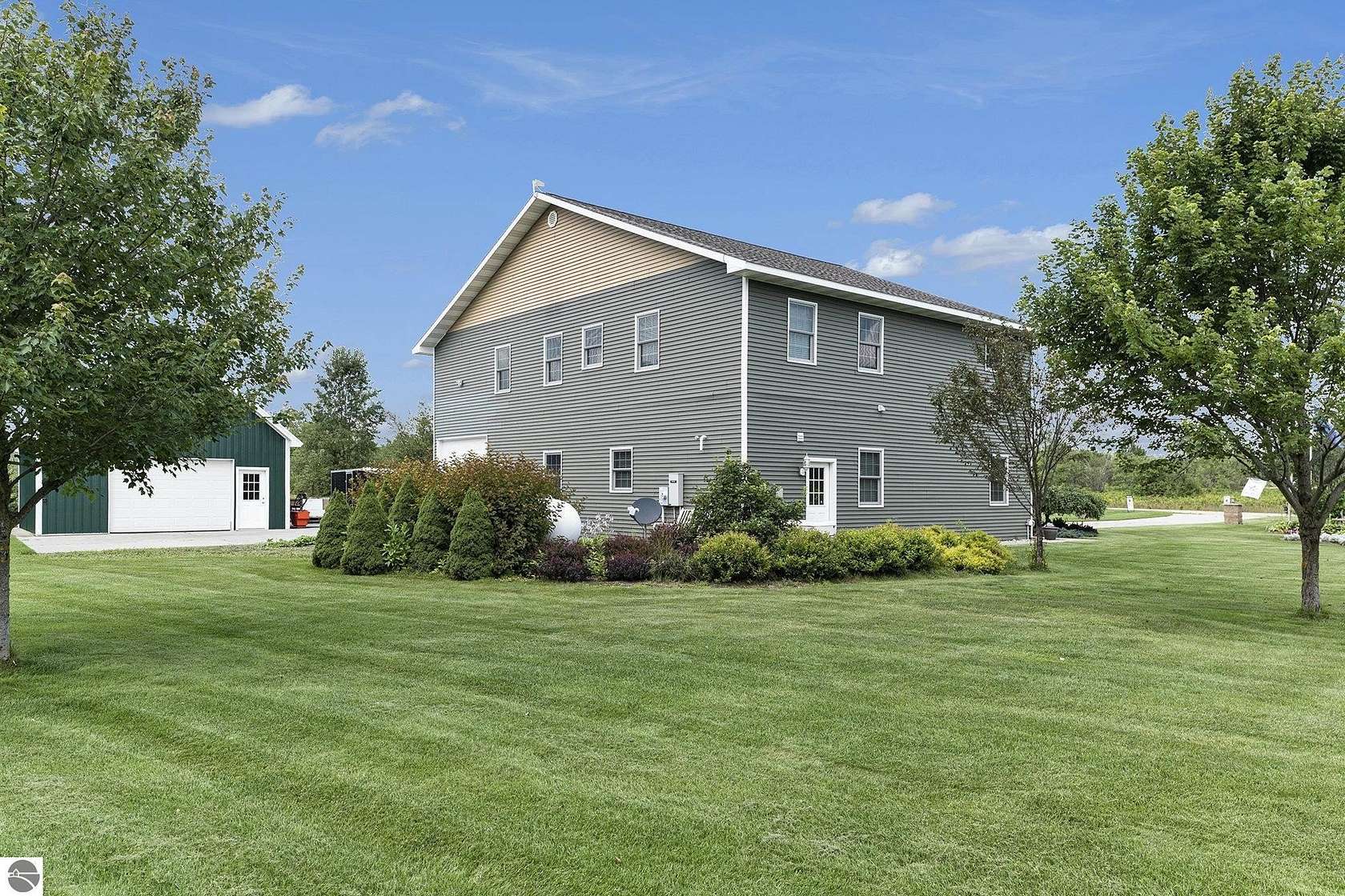 1.65 Acres of Residential Land with Home for Sale in Elmira, Michigan