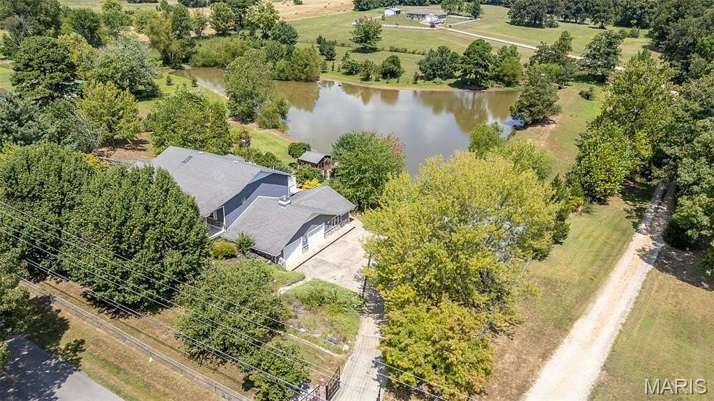 4.84 Acres of Land with Home for Sale in Poplar Bluff, Missouri