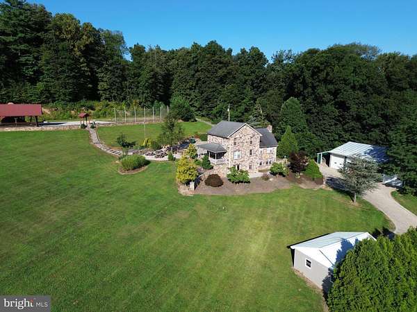 69.2 Acres of Land with Home for Auction in Loysville, Pennsylvania