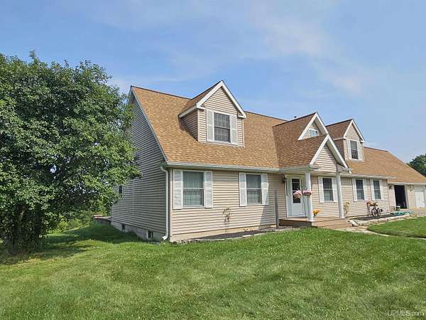 20 Acres of Recreational Land with Home for Sale in Iron River, Michigan