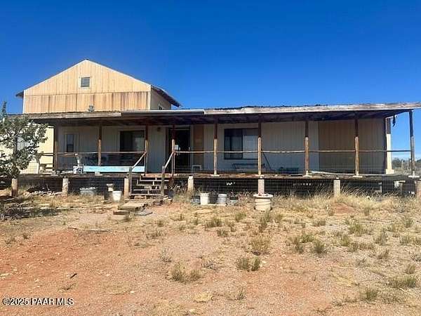 2.7 Acres of Residential Land with Home for Sale in Seligman, Arizona