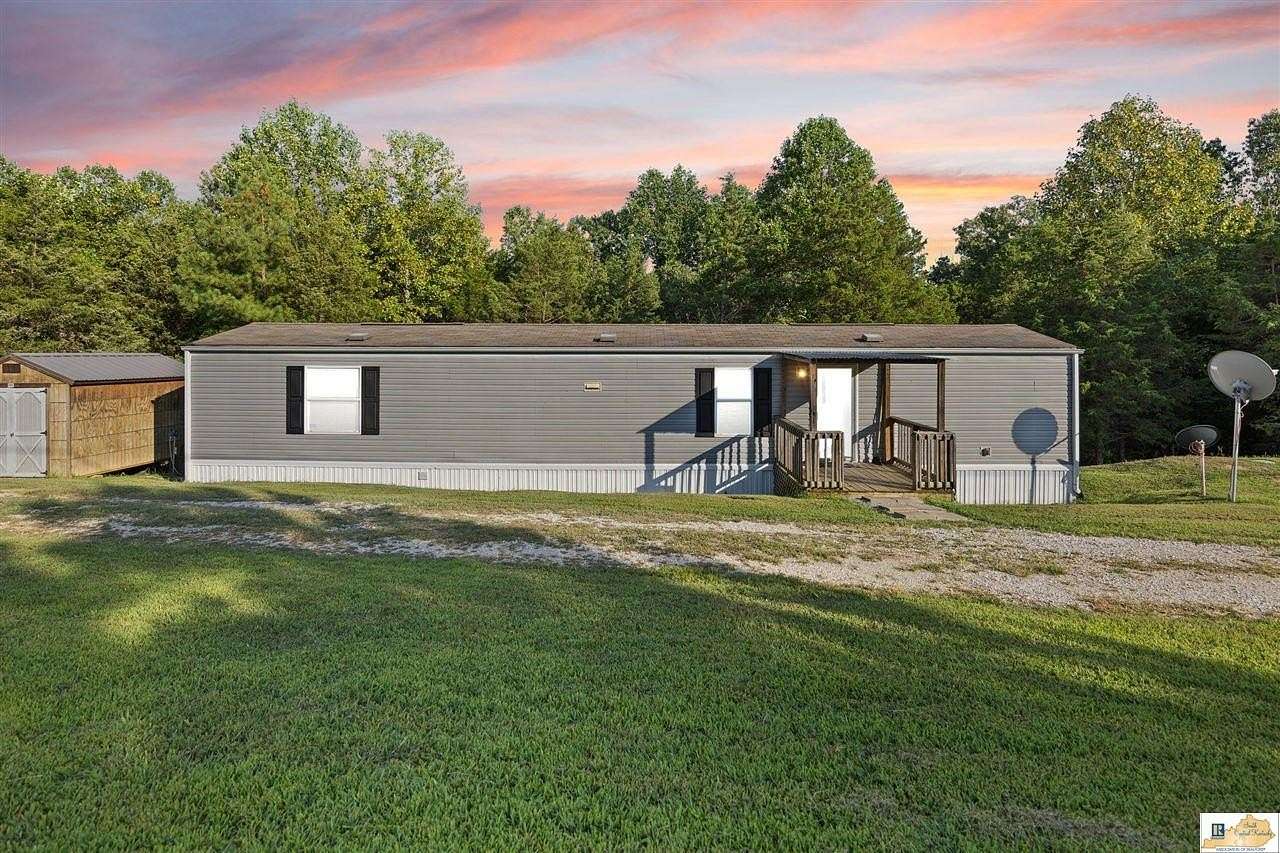 6 Acres of Residential Land with Home for Sale in Edmonton, Kentucky