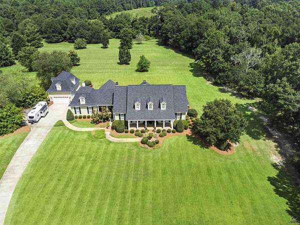 14.5 Acres of Land with Home for Sale in Bonaire, Georgia