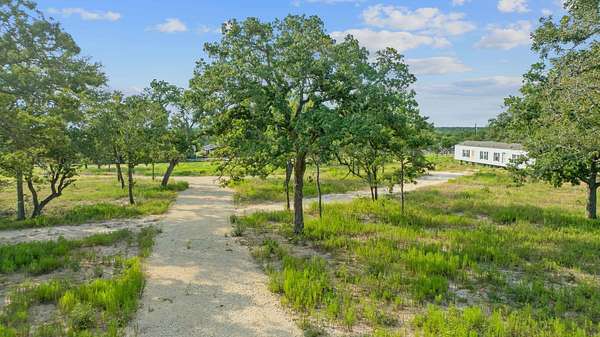 16.2 Acres of Land with Home for Sale in Dale, Texas