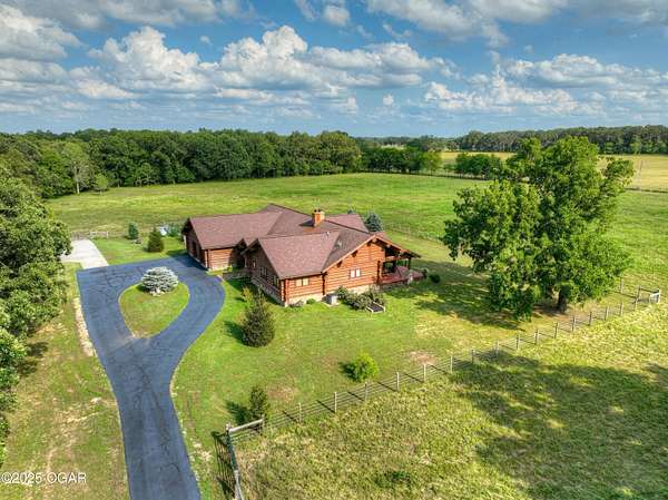 33 Acres of Land with Home for Sale in Diamond, Missouri