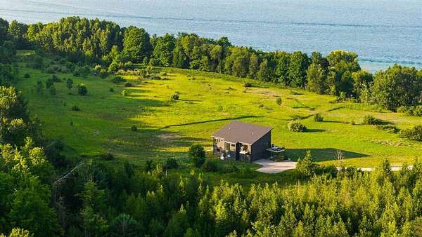 27 Acres of Recreational Land with Home for Sale in Boyne City, Michigan