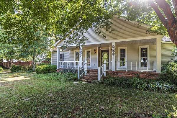 5.6 Acres of Residential Land with Home for Sale in Millington, Tennessee