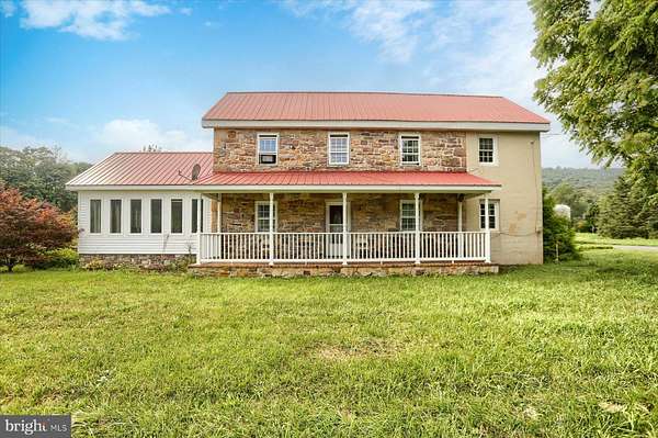 21.7 Acres of Land with Home for Auction in East Waterford, Pennsylvania