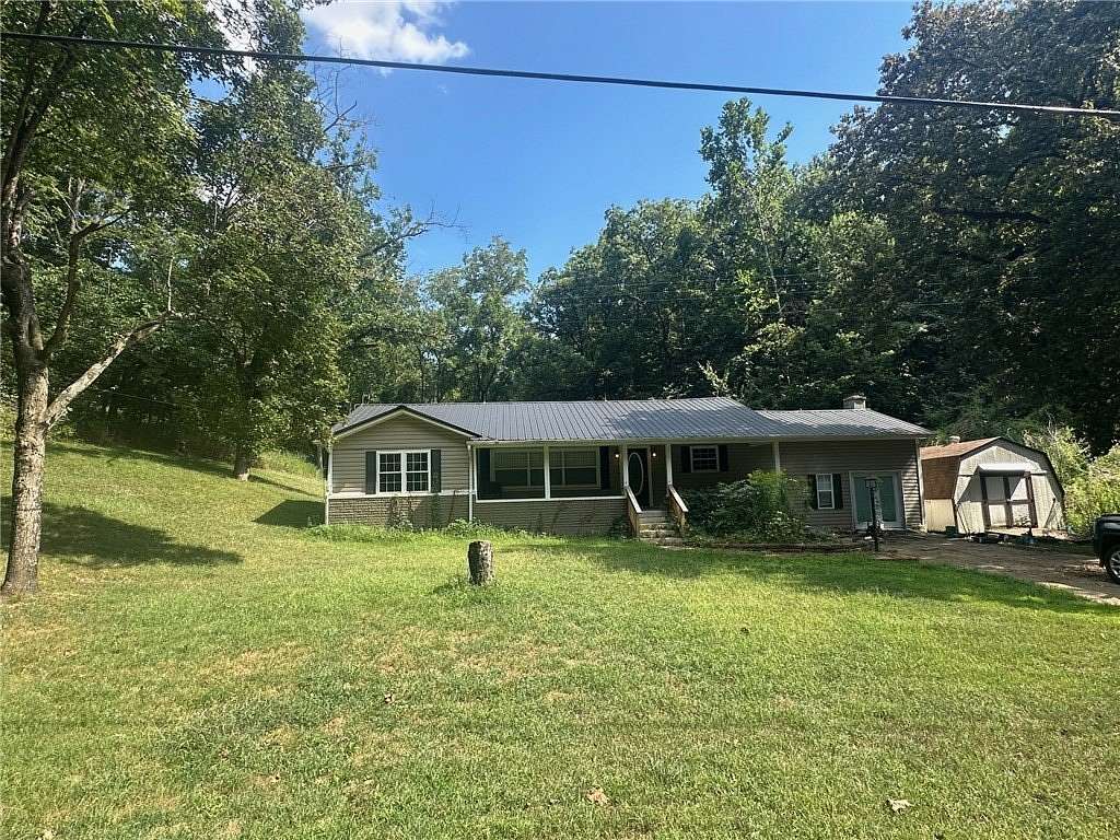 2.25 Acres of Land with Home for Sale in Berryville, Arkansas