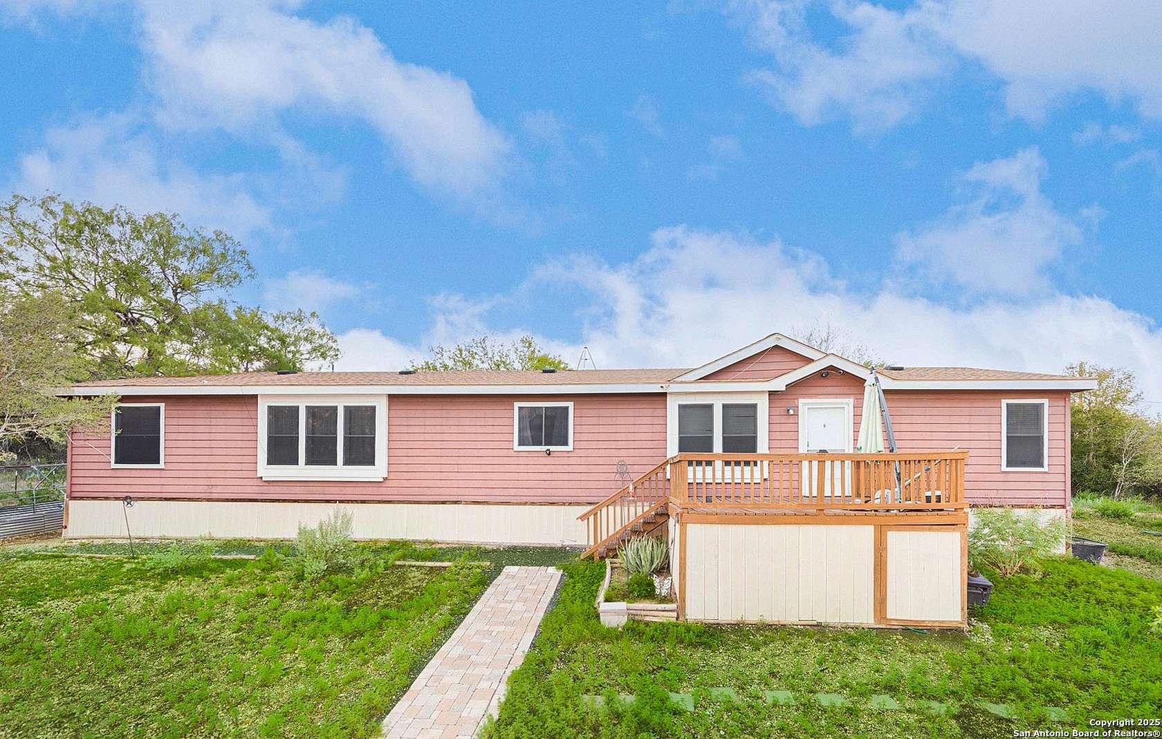 5 Acres of Residential Land with Home for Sale in Castroville, Texas