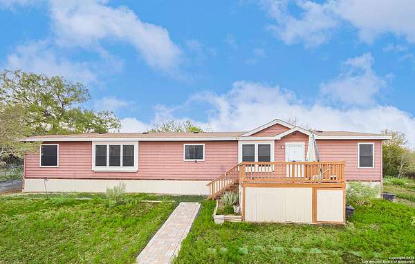 5 Acres of Residential Land with Home for Sale in Castroville, Texas