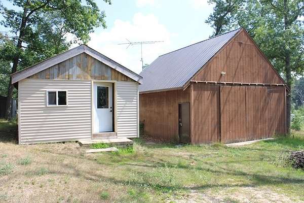 0.5 Acres of Residential Land with Home for Sale in Harrison, Michigan