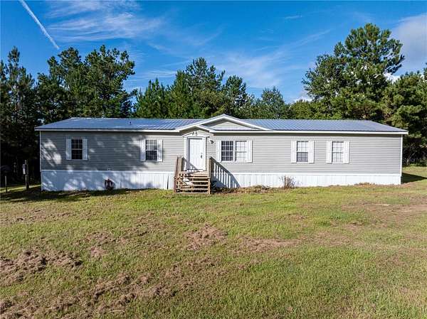 4.77 Acres of Residential Land with Home for Sale in Wellborn, Florida