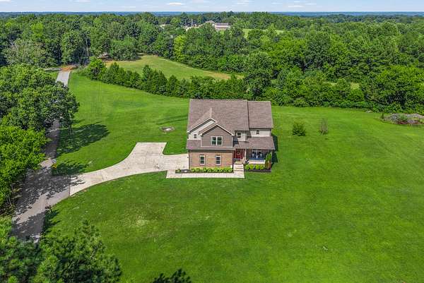 1.5 Acres of Residential Land with Home for Sale in Cunningham, Tennessee