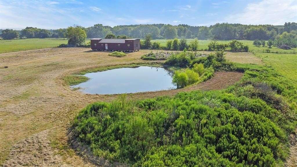 5.1 Acres of Land with Home for Sale in Grand Saline, Texas