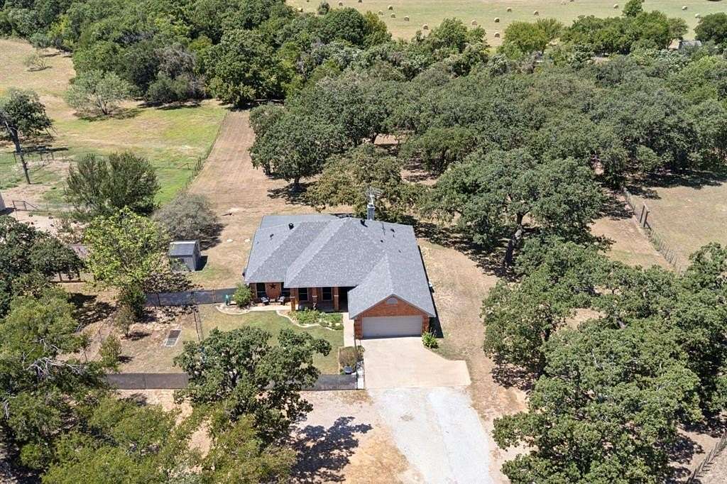 3 Acres of Residential Land with Home for Sale in Springtown, Texas