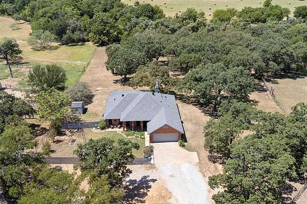 3 Acres of Residential Land with Home for Sale in Springtown, Texas