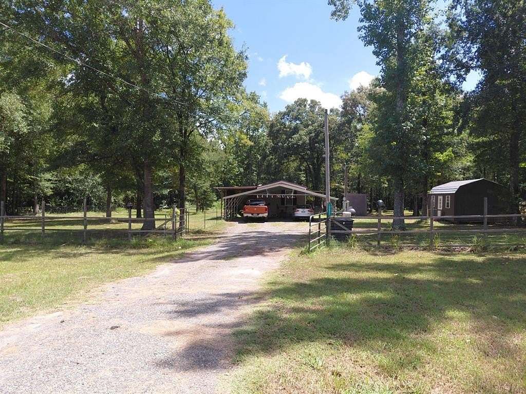 10.5 Acres of Land with Home for Sale in Mooringsport, Louisiana