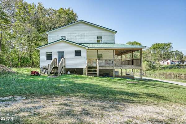 3 Acres of Land with Home for Sale in Deer Lodge, Tennessee