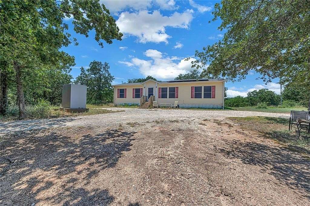 7 Acres of Residential Land with Home for Sale in Whitney, Texas