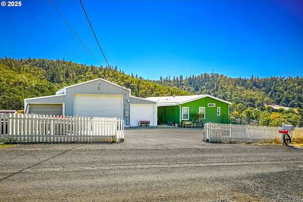80 Acres of Agricultural Land with Home for Sale in Roseburg, Oregon