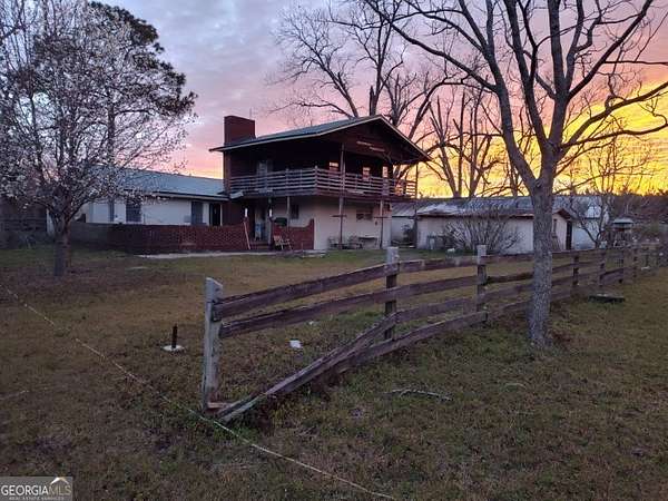 5 Acres of Residential Land with Home for Sale in Odum, Georgia