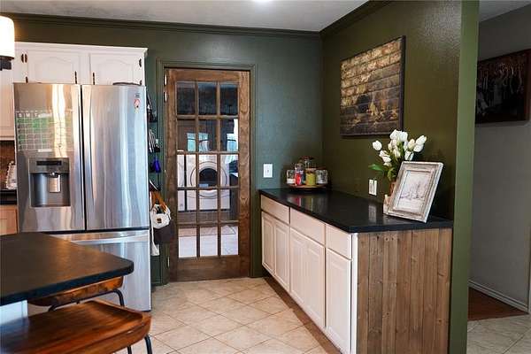 5 Acres of Residential Land with Home for Sale in Paris, Texas