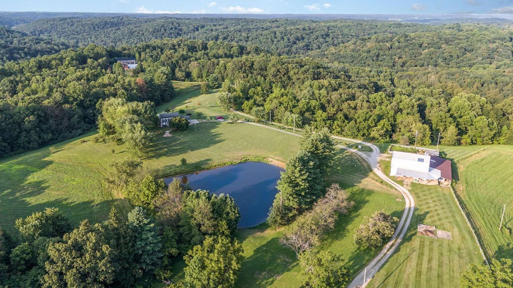 24.3 Acres of Land with Home for Sale in Rockbridge, Ohio