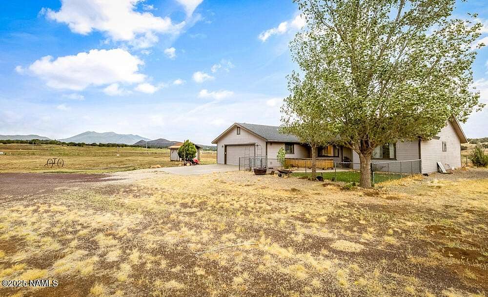 5.2 Acres of Land with Home for Sale in Flagstaff, Arizona