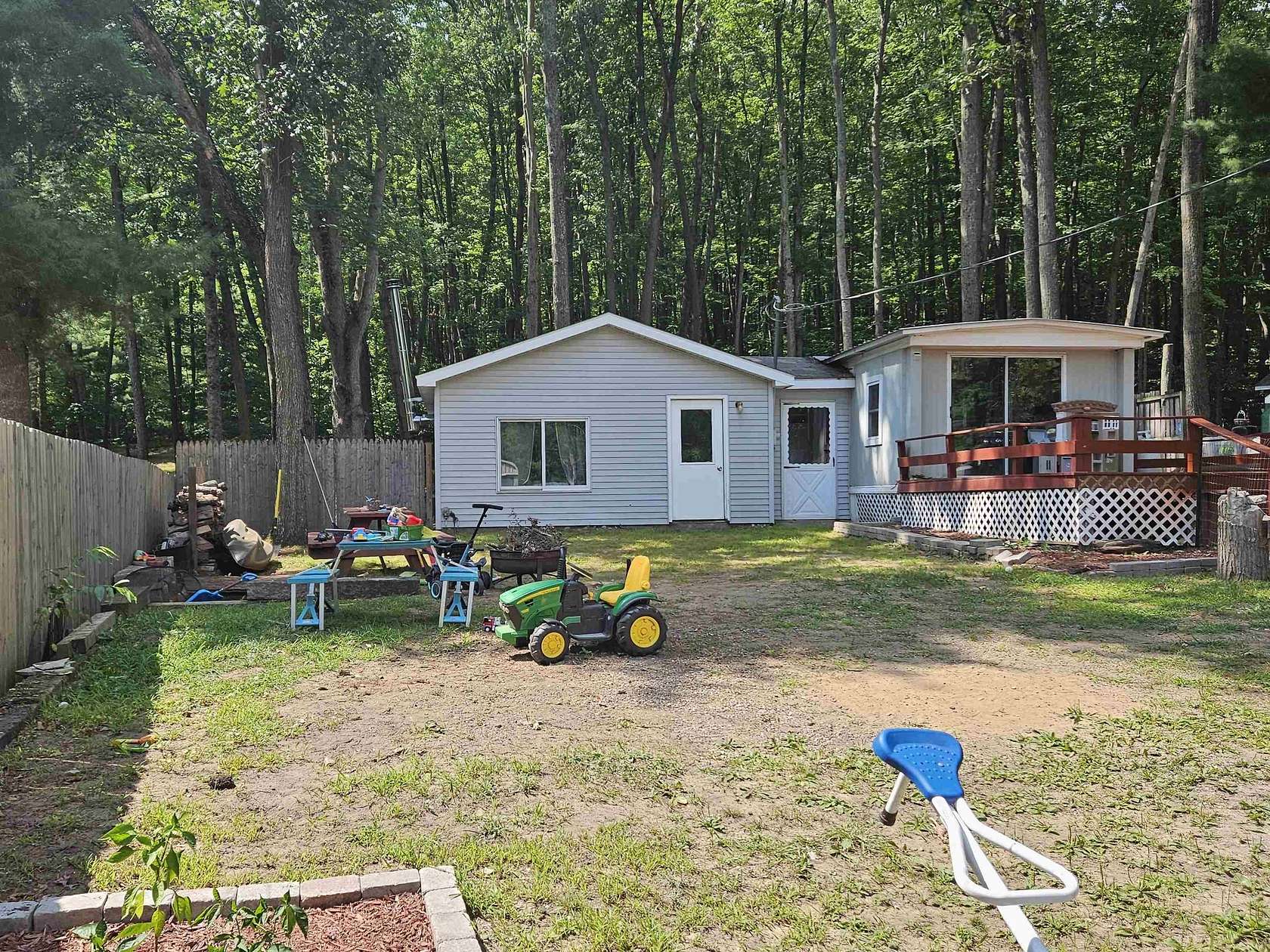 1.8 Acres of Residential Land with Home for Sale in Harrison, Michigan