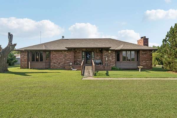 5.6 Acres of Residential Land with Home for Sale in Wellington, Kansas