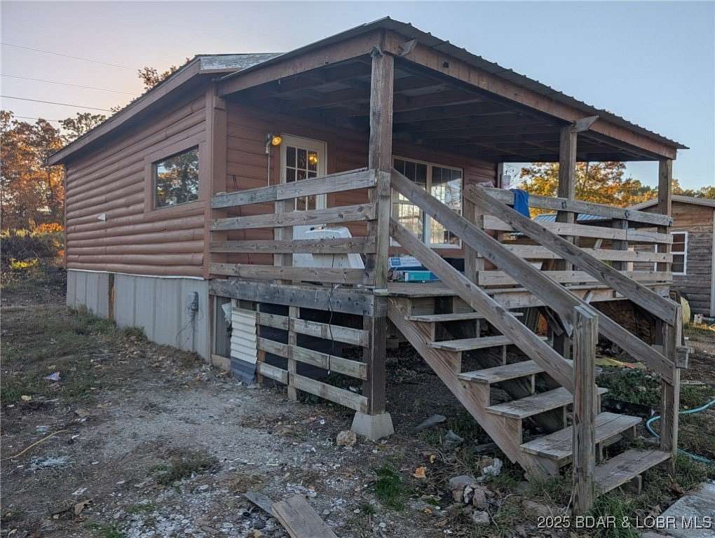 3 Acres of Residential Land with Home for Sale in Sunrise Beach, Missouri