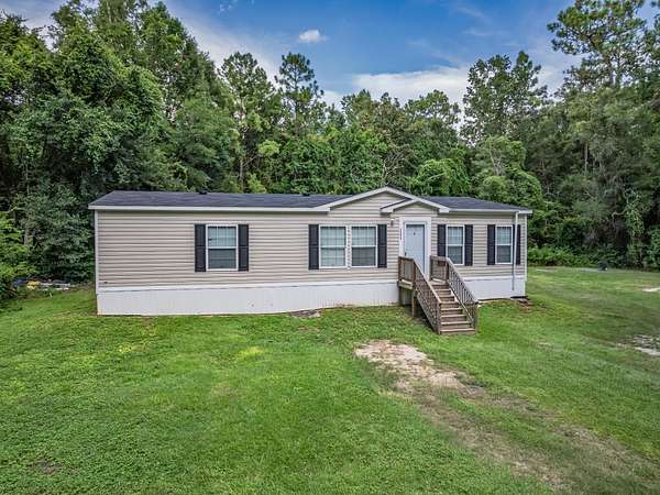 5.35 Acres of Residential Land with Home for Sale in Tallahassee, Florida