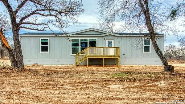 10.8 Acres of Land with Home for Sale in St. Hedwig, Texas