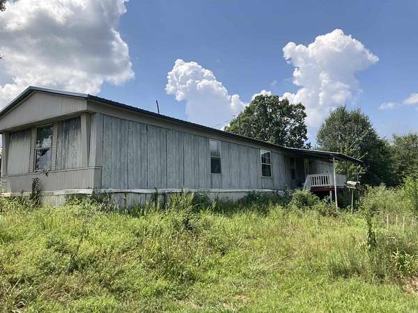 12.4 Acres of Land with Home for Sale in Cove, Arkansas