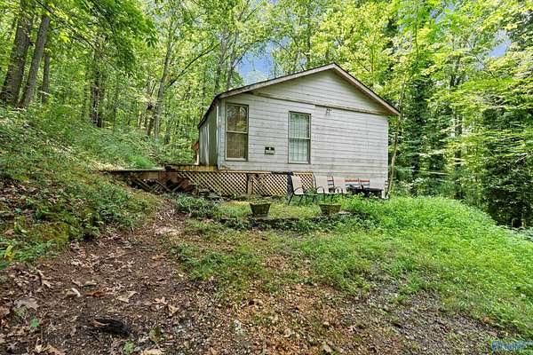 13.2 Acres of Recreational Land with Home for Sale in New Hope, Alabama